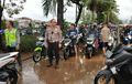 Dirlantas Polda Metro Jaya, Kombes Sambodo Atur Lalu Lintas Macet Karena Banjir