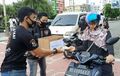 Lawan Penyebaran Covid-19 Komunitas Biker Honda HABA Bagi-bagi Masker di Banda Aceh