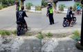 Melintas di Dekat Polisi Naik Vega R Knalpot Brong, Pengendara Enggak Pakai Helm Ini Bisa Lolos Tilang, Kok Bisa?