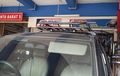 Cara Mengemudi Mobil dengan Roof Rack yang Berisi Barang Bawaan