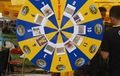 Putar Wheel Of Fortune di Booth Hella, Bisa Dapat Handphone!