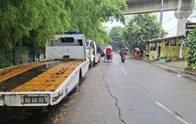 Jalan Haji Lebar Meruya Selatan Bak Kandang Truk Towing, Warga Curiga Ada Setoran