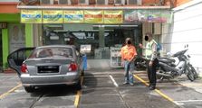 Foto Banner Indomaret Viral, Tukang Parkir Bisa Dilaporkan Polisi