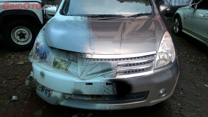 Body repair mobil bekas tabrakan