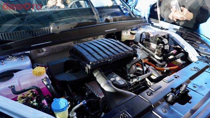 Mesin Omoda 7 H4J15 1.500 cc 4 silinder segaris turbo dengan tenaga 154 dk dan torsi 220 Nm dikombinasikan dengan motor elektrik 1DHT130 