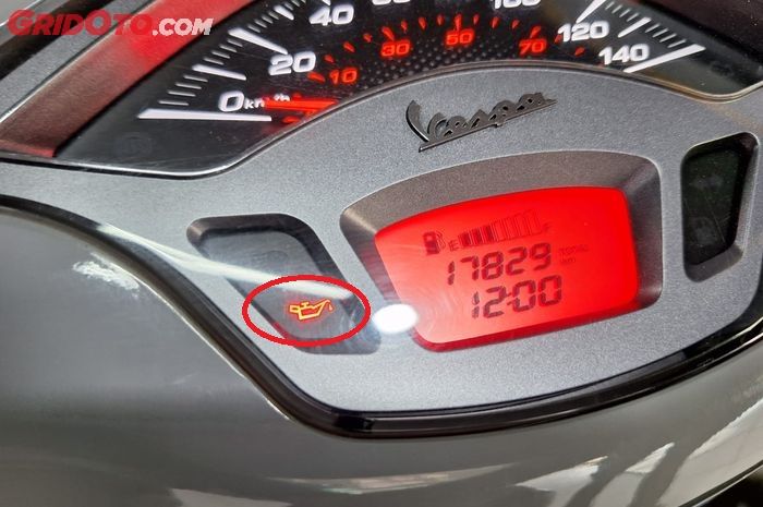 Logo corong muncul terus di speedometer Vespa matic pertanda bahaya 