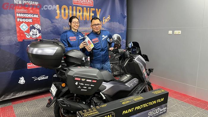 Ricky Rinaldo dan Adriana Vonny Ramli yang populer dengan nama Pasutri Touring