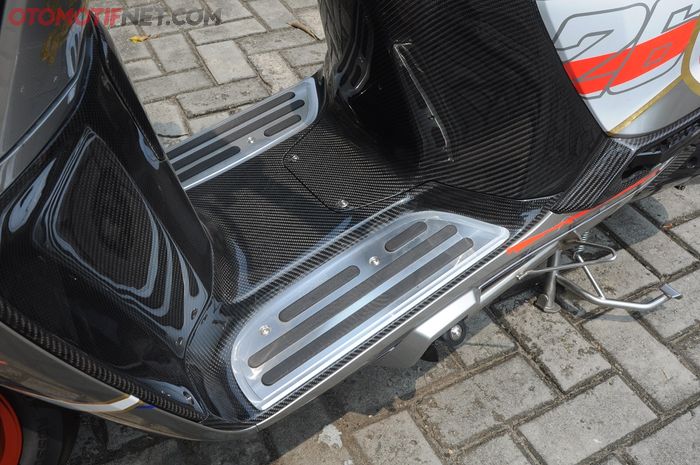  Bagian bodi kasar Honda Giorno+ kena lapisan karbon