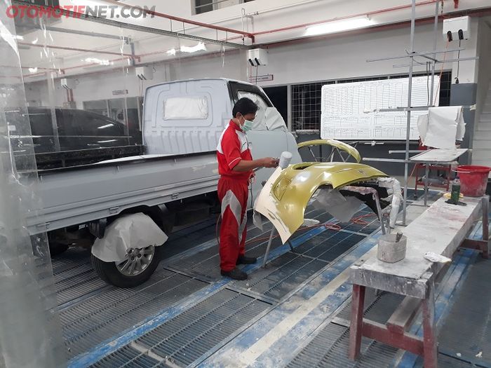 Ilustrasi suasana bengkel body repair