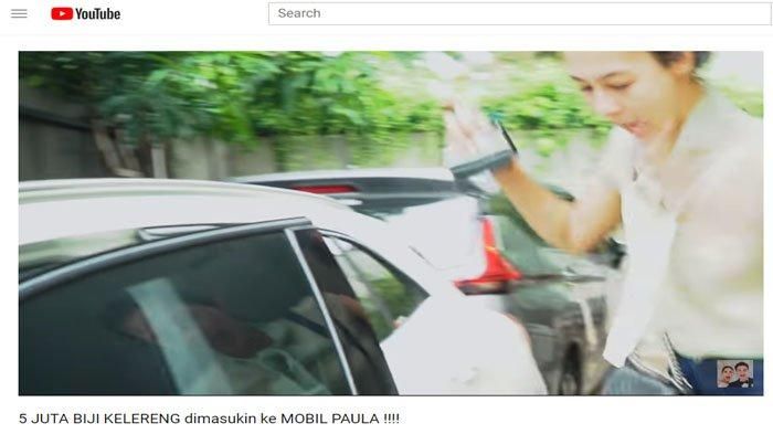 Reaksi Paula Verhoeven saat membuka pintu mobilnya yang penuh dengan kelereng. (Youtube/Baim Paula)