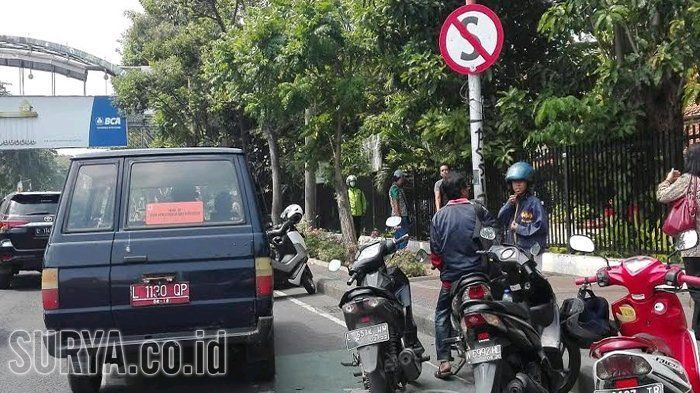 Ilustrasi rambu lalu lintas dilarang berhenti