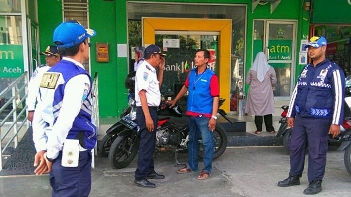 Ilustrasi juru parkir liar diamankan oleh petugas gabungan Dinas Perhubungan dengan Polresta Kota Banda Aceh.