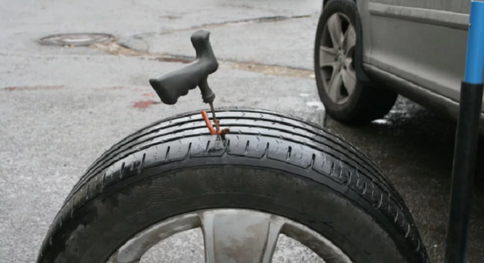 Ilustrasi tambal ban model tusuk