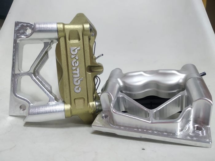 Bracket kaliper CNC, lebih rapi tapi lebih mahal