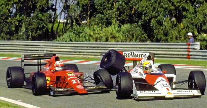 Nigel Mansell diganjar larangan membalap akibat mundur di pit lane dan mengacuhkan bendera hitam, ditambah menabrak Ayrton Senna di F1 Portugal 1994.