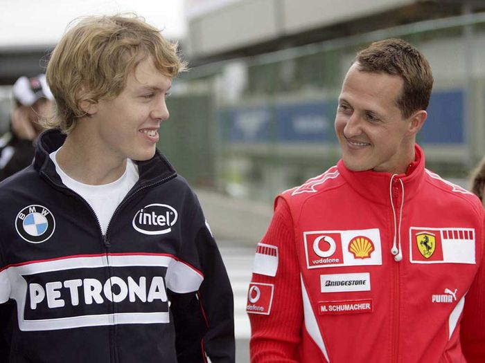 Sebastian Vettel di tim BMW Sauber bersama Michael Schumacher