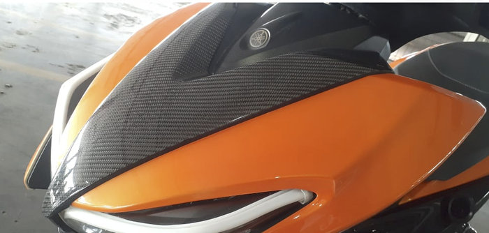 Body repaint oranye dipadu karbon kevlar