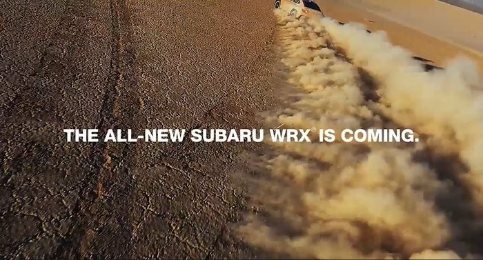 Tangkapan layar video teaser Subaru WRX, menampilkan sedikit bagian belakang mobil tersebut.