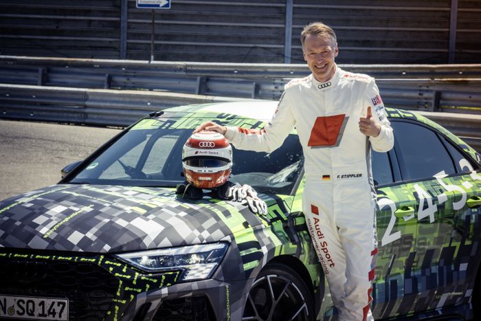Frank Stippler, pembalap Audi Sport, bersama Audi RS3 Sedan.