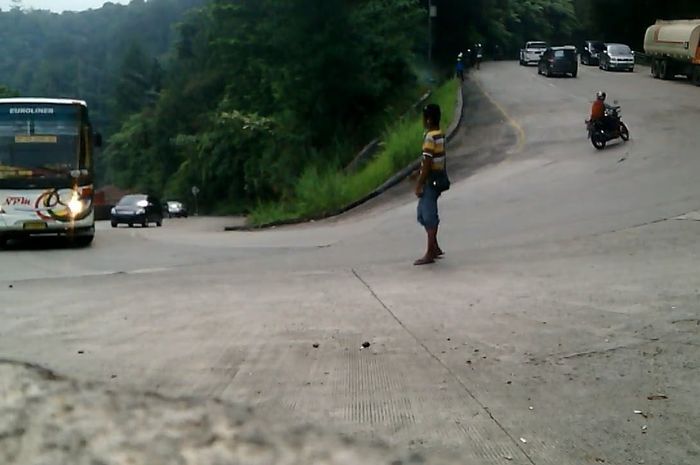 Pak Ogah di Sitinjau Lauik