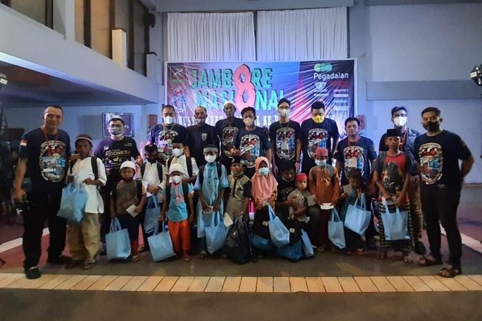 Kawasaki Z Owners Indonesia (KZOI) gelar Jamnas dan Munas, sahkan ketua umum baru sambil berbagi dengan anak yaitm.