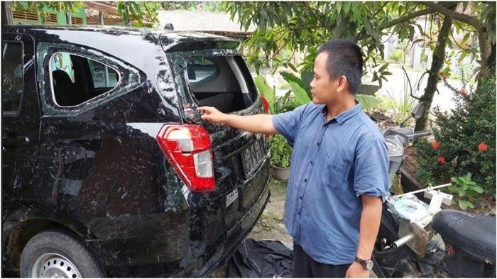 Kondisi Daihatsu Sigra Zainul setelah tercebur, terseret dan tenggelam di sungai irigasi desa Pahang Asri, Buay Pemuka Peliuang, OKU Timur, Sumsel