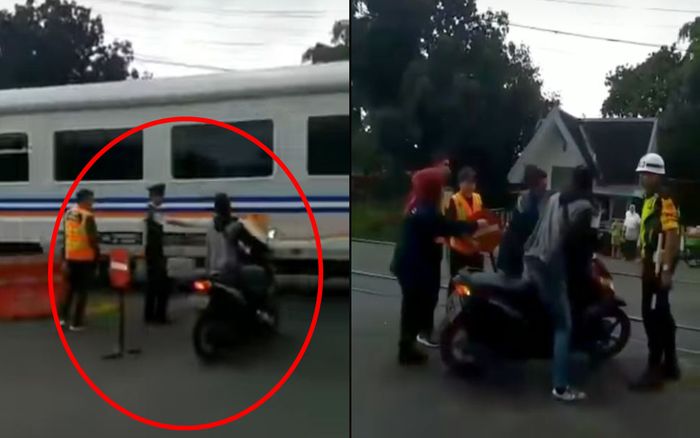 tangkap layar video seorang pengendara motor yang nekat menerobos perlintasan rel kereta api.
