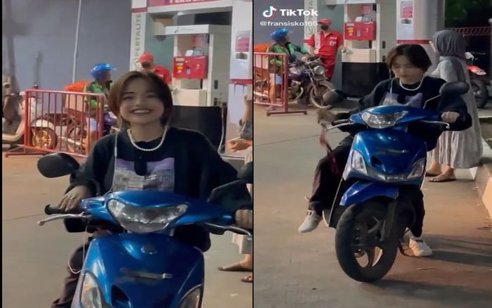 Jeje Slebew tersenyum ramaha kepada perekam video saat dirinya kepergok ngisi bensin naik Yamaha Mio di SPBU.