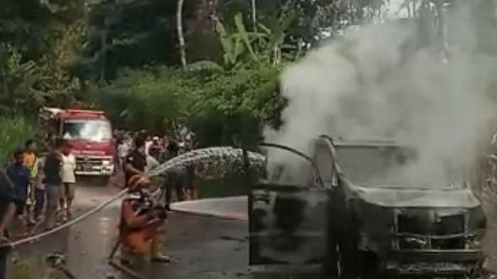 Pemadam kebakaran menyemprot air ke Toyota Alphard yang terbakar di Ungaran Barat, kabupaten Semarang