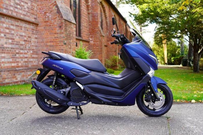 Tampak samping WK MXI 125