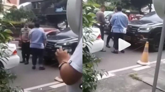 Polisi menghentikan Toyota Fortuner berpelat dinas Polri 3213-15 lengkap dengan strobo, sopir bertubuh subur dimasukan mobil patroli