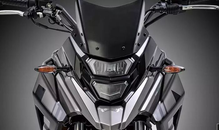 desain headlamp dan fascianya sekilas mirip Hona CB150X.