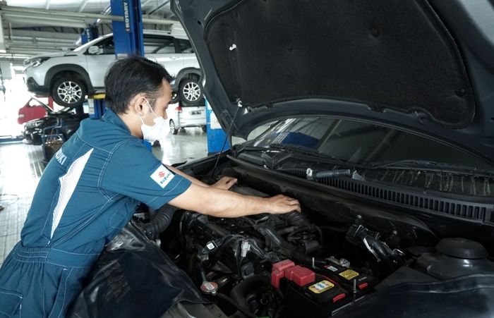 Ilustrasi servis mobil Suzuki