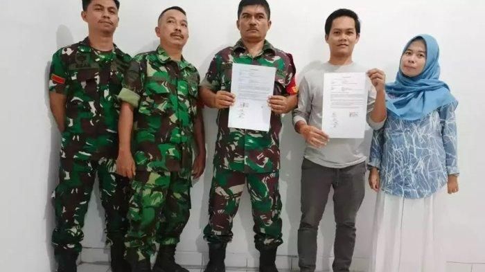 Tiga anggota TNI AU dan sopir taksi online yang sempat duel berfoto bersama