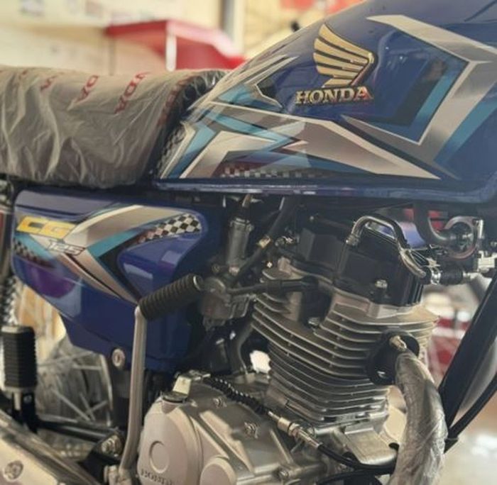 pakai mesin 125 cc dengan sistem pengabut bahan bakar karburator