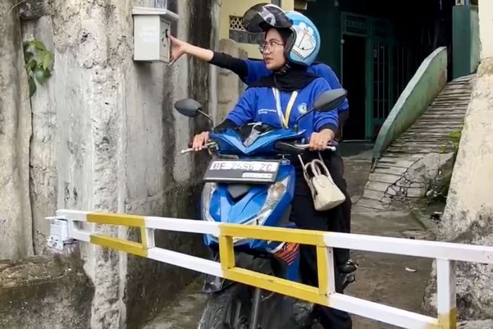 Portal fingerprint yang dibuat mahasiswa KKN untuk mencegah maling beraksi di kampung tersebut