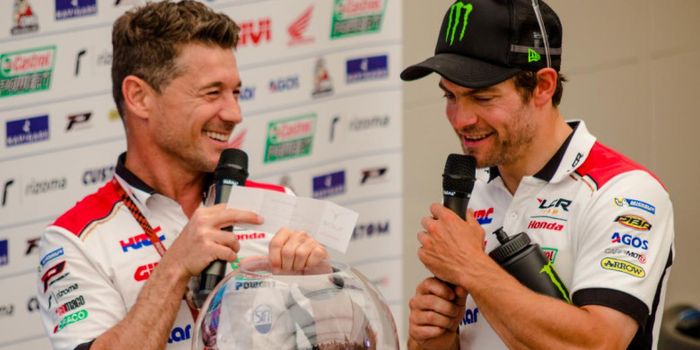 Lucio Cecchinello dan Cal Crutchlow.