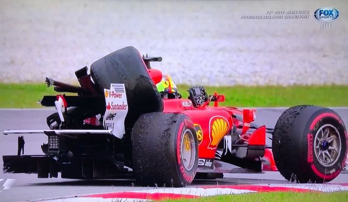Bagian belakang mobil Ferrari andalan Sebastian Vettel hancur setelah balapan di F1 Malaysia