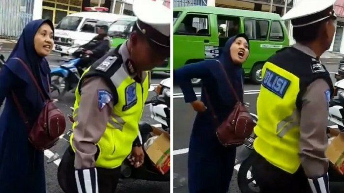 Tangan seorang polisi yang digigit emak-emak karena menolak ditilang.