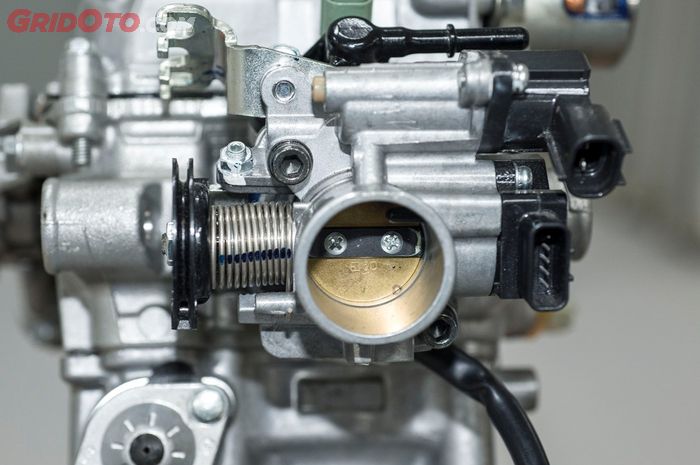 Ilustrasi throttle body injeksi di motor bekas