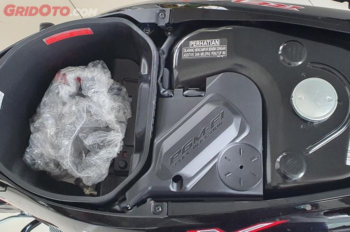Bagasi dan cover fuel pump sistem injeksi Honda Revo FI