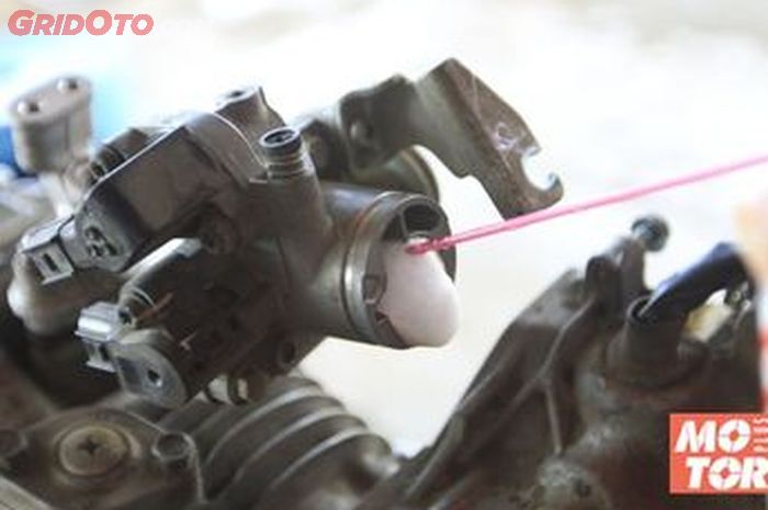 Ilustrasi throttle body motor bekas injekso