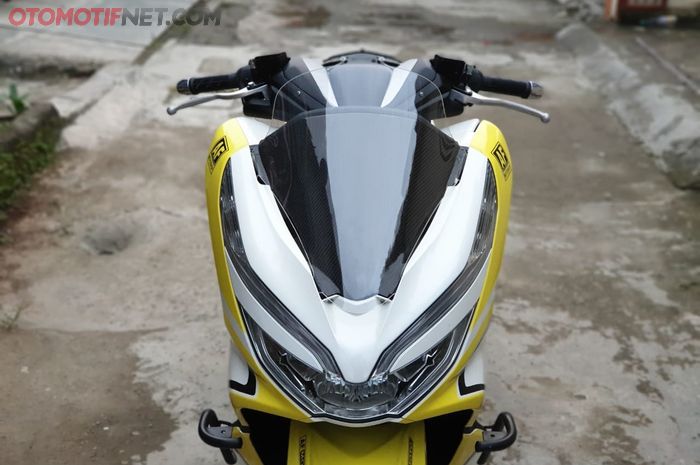 Handlebar cover yang dipasang ke Honda PCX