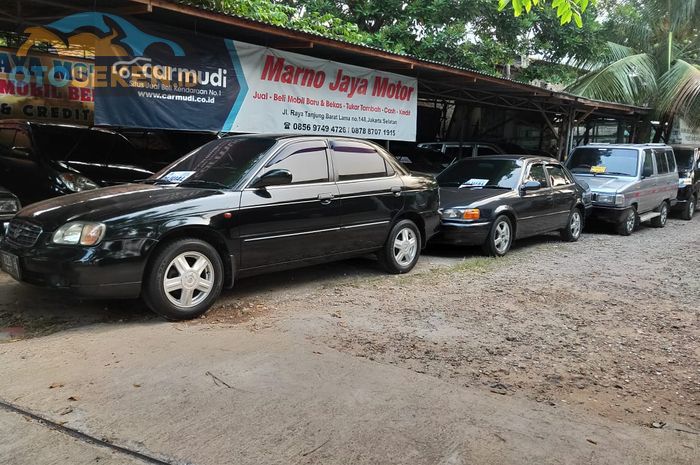 Ilustrasi showroom mobil-mobil tua Marno Jaya Motor (MJM) di Jagakarsa Jakarta Selatan