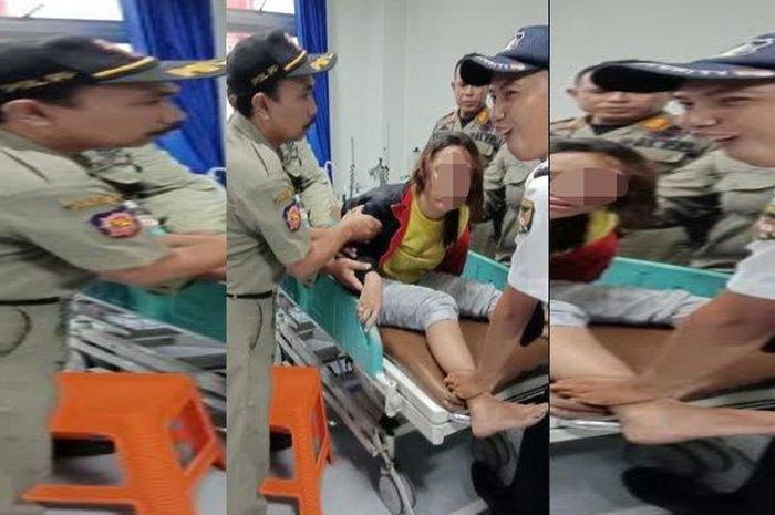 Petugas Satpol PP menolong korban lakalantas di depan Taman Sekartaji, Kota Kediri