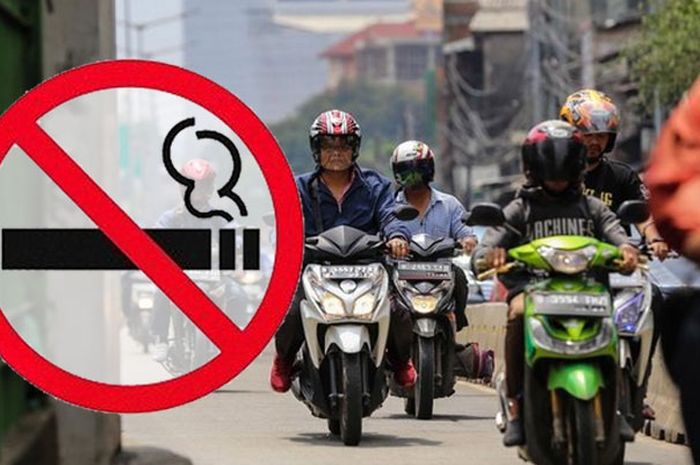 Mengendarai motor tidak boleh sambil merokok