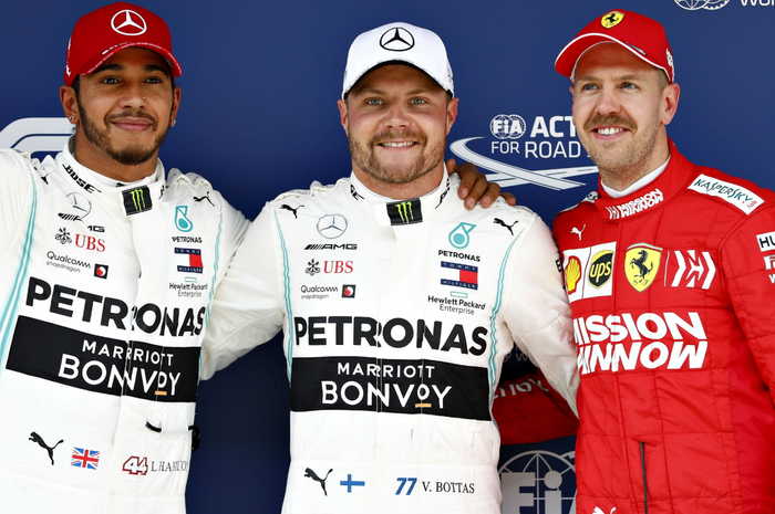 Dari kiri ke kanan: Lewis Hamilton, Valtteri Bottas, dan Sebastian Vettel