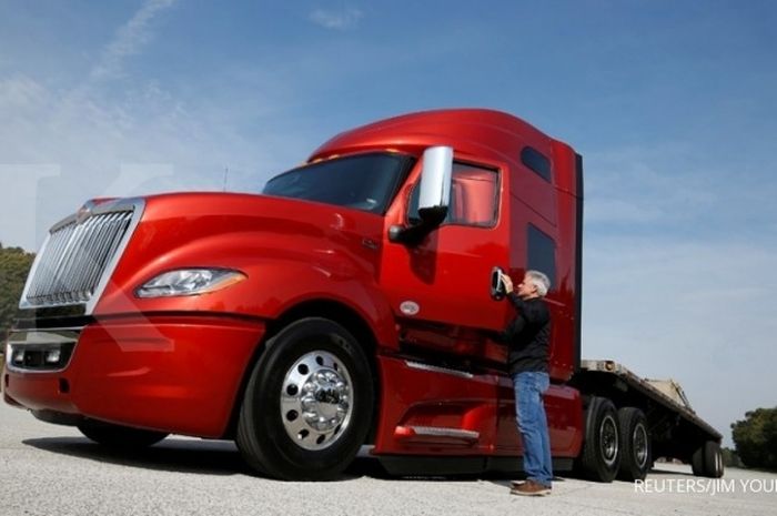 Navistar Senior Vice President Dennis Mooney gets out of a Navistar LT Series truck at the Navistar Proving Grounds in New Carlisle