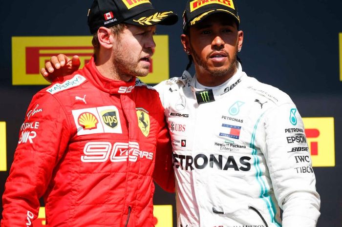 Sebastian Vettel (kiri) dan Lewis Hamilton saat berbagi podium pertama di F1 Kanada (9/6)