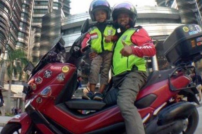 Lilik Gunawan, anggota DPRD Kabupaten Merangin, Jambi riding bersama putranya berumur 4 tahun ke Mekkah naik Yamaha NMAX